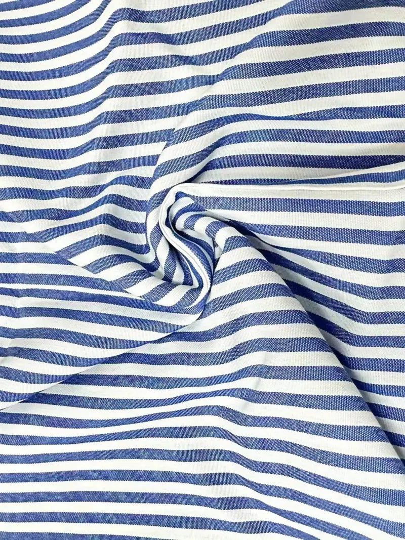 VioraLijn – Gestreepte zomerjurk met speelse zakken en luchtige elegantie