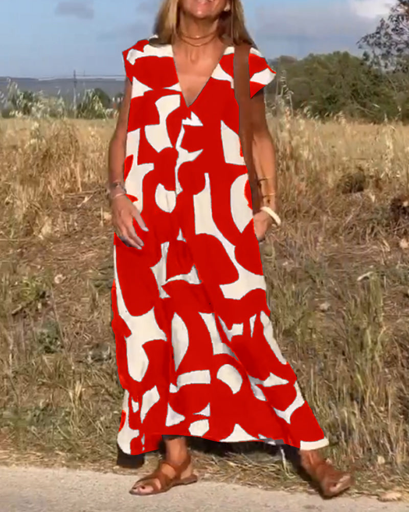 ELVIRA – Gedrukte V-hals jurk met elegante snit en zomerse flair