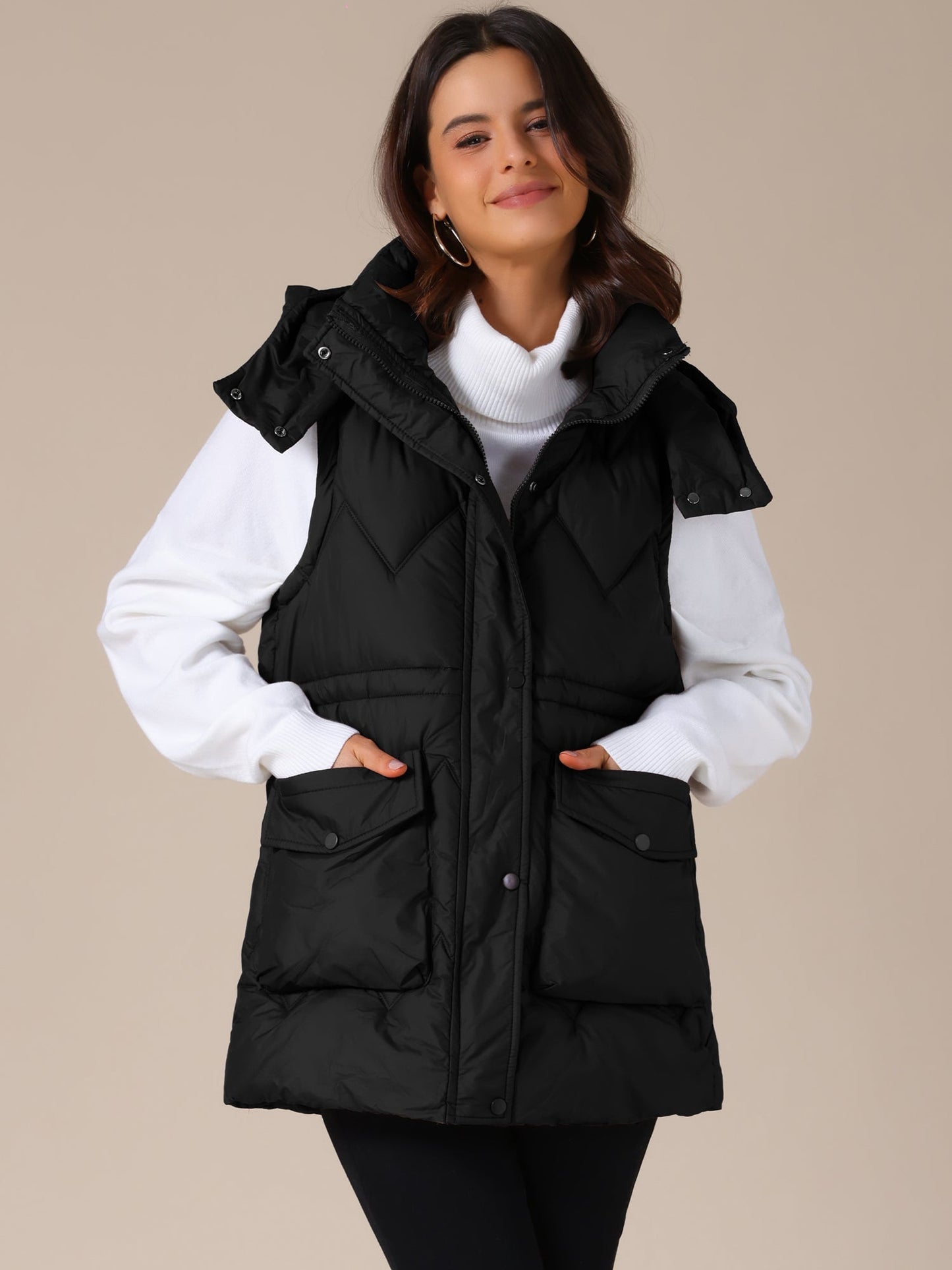 NAYLA – Lange gewatteerde dames bodywarmer met capuchon - Glamorix