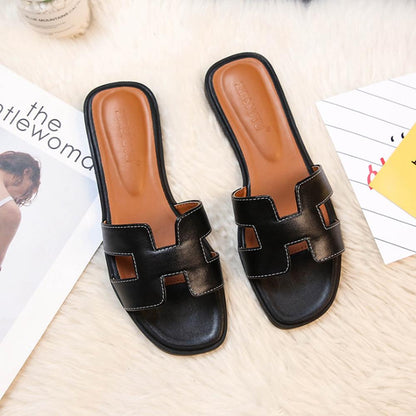 Elegante dames instapsandaal met iconische H-band – HARLIA SLIDE - Glamorix