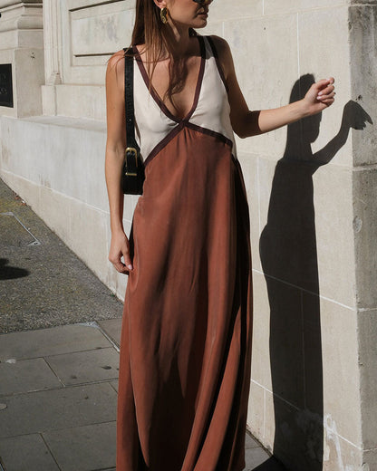 Vloeiende maxi-jurk met diepe V-hals en elegante details – LUMINA - Glamorix