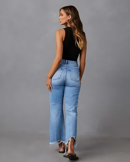 HARLOW - Casual lichtblauwe flare jeans met gerafelde knieën