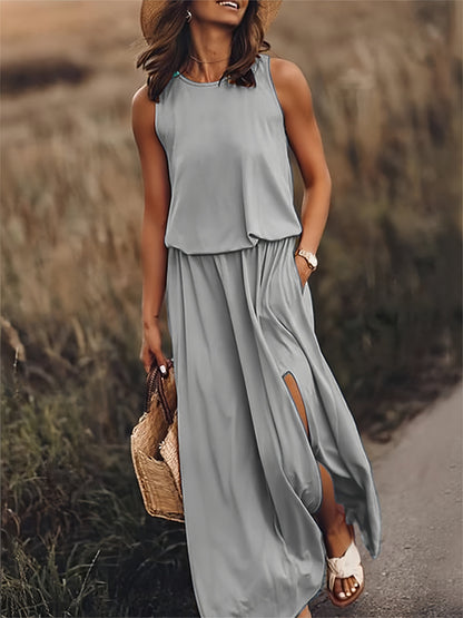 Mouwloze maxi zomerjurk met split en elegante flow – LUNA BREEZE - Glamorix