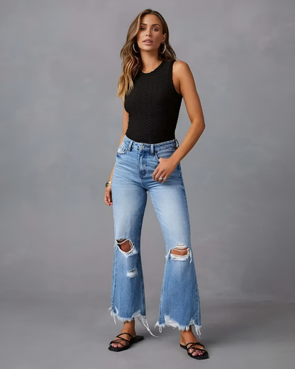 HARLOW - Casual lichtblauwe flare jeans met gerafelde knieën