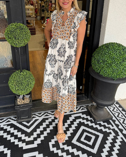 Mouwloze zomerjurk met bloemenprint en volantkraag – FLORINA BLOOM - Glamorix