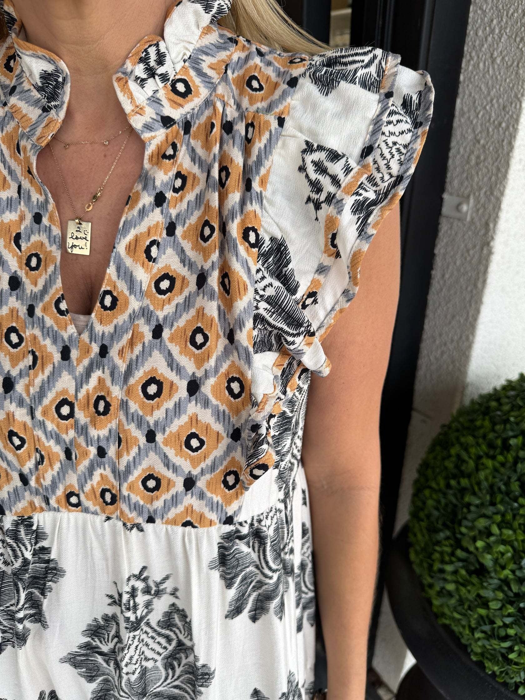 Mouwloze zomerjurk met bloemenprint en volantkraag – FLORINA BLOOM - Glamorix