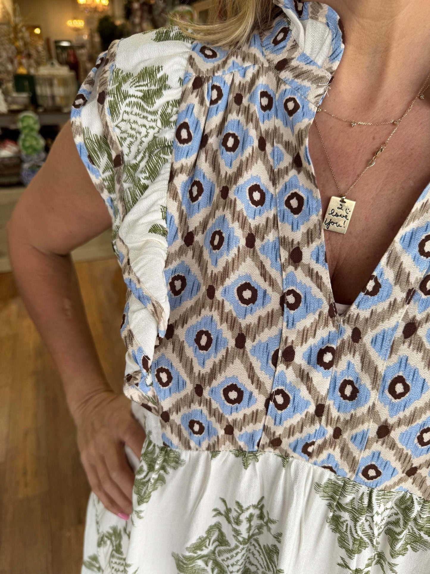 Mouwloze zomerjurk met bloemenprint en volantkraag – FLORINA BLOOM - Glamorix