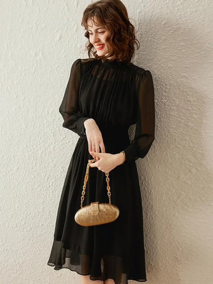 Elegante midi-jurk met hoge hals en transparante mouwen – LUMINA GRACE - Glamorix