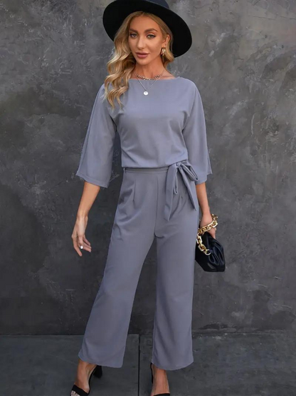 MADELEINE - Elegante jumpsuit met brede pijpen en tailleband