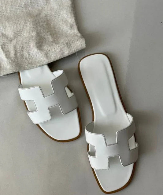 Elegante dames instapsandaal met iconische H-band – HARLIA SLIDE - Glamorix