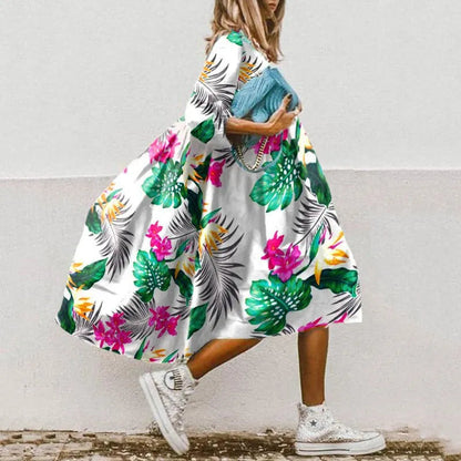 Wijde dames midi-jurk met ballonmouwen en elegante flair – CÉLINA BREEZE - Glamorix