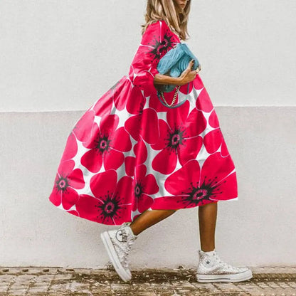 Wijde dames midi-jurk met ballonmouwen en elegante flair – CÉLINA BREEZE - Glamorix
