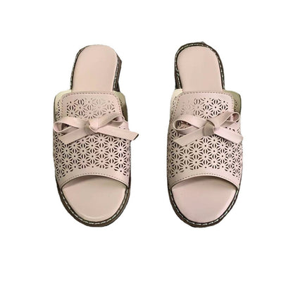 Luchtige dames instapslippers met strikdetail en geperforeerd design – ADELIA BREEZE - Glamorix