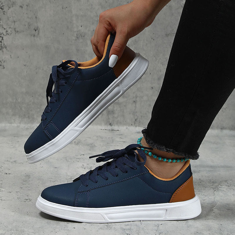 Modieuze lage sneaker met subtiel contrastdetail – ASTELLA - Glamorix