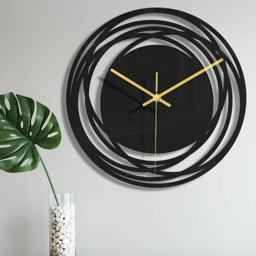 GLODEN GLOW - Moderne metalen wandklok in zwart en goud