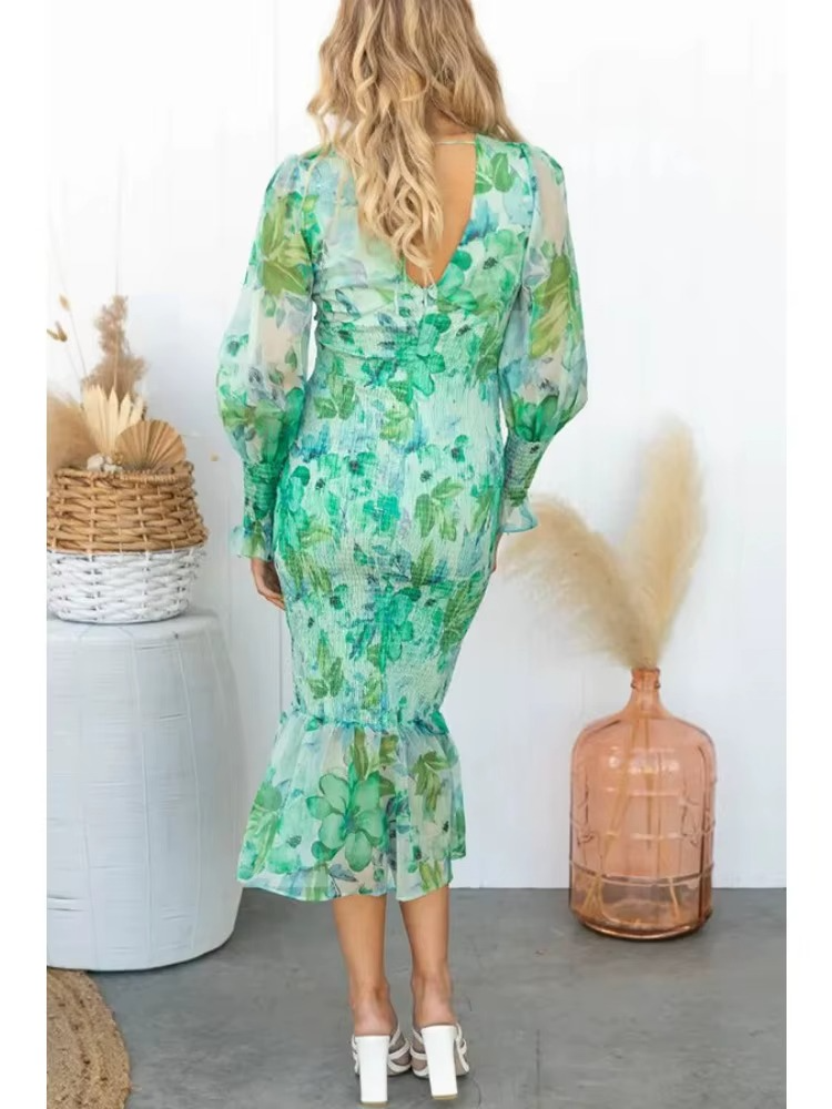 Sigrid - Midi jurk met v-hals en pofmouwen - Glamorix