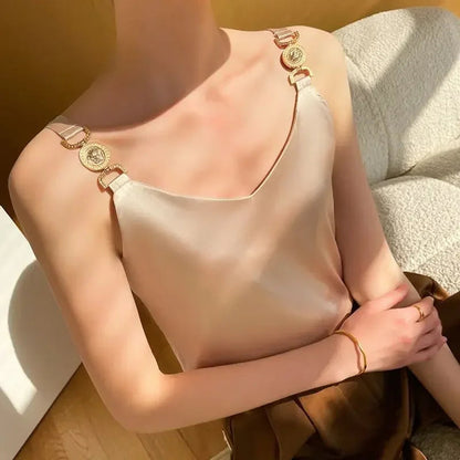 Chique dames top met V-hals en gouden schouderaccenten – LIA GLOW - Glamorix