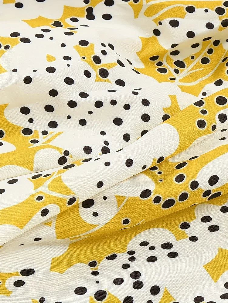 Elegante maxi zomerjurk met speelse print en V-hals – LUNARA FLOW - Glamorix