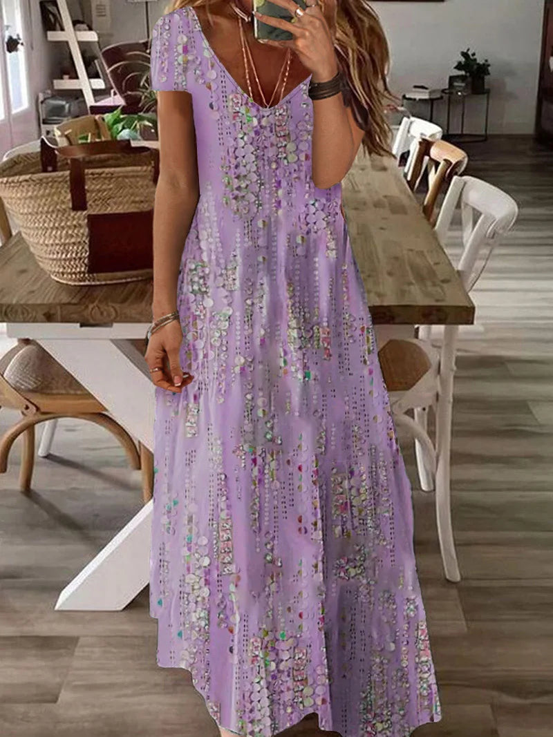 Luchtige maxi zomerjurk met V-hals en bohemian flair – ELARA VIBE - Glamorix