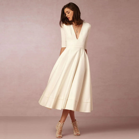Vrouwelijke midi-jurk met V-hals en halve mouwen – SOLEA GRACE - Glamorix