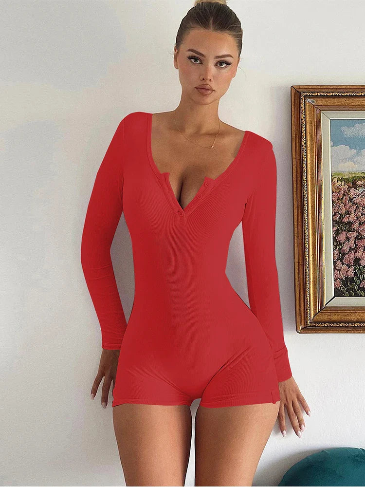 Getailleerde rib dames jumpsuit met knoopdetail – MIRA FORM - Glamorix