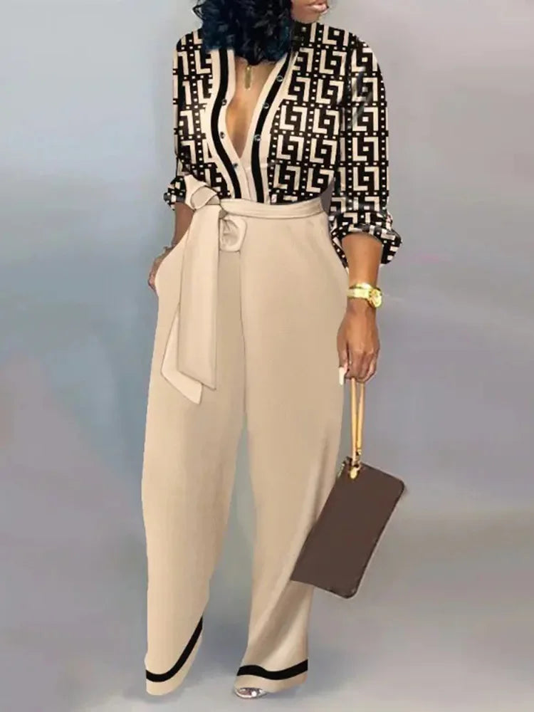 Elegante wijde damesjumpsuit met diepe V-hals en strikceintuur – SENA FLOW - Glamorix