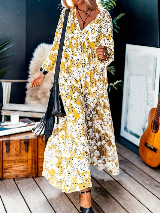 Elegante maxi zomerjurk met speelse print en V-hals – LUNARA FLOW - Glamorix