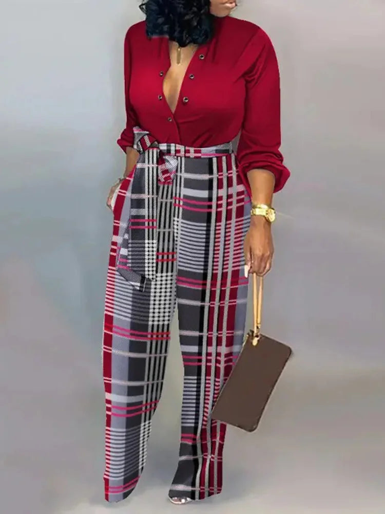 Elegante wijde damesjumpsuit met diepe V-hals en strikceintuur – SENA FLOW - Glamorix