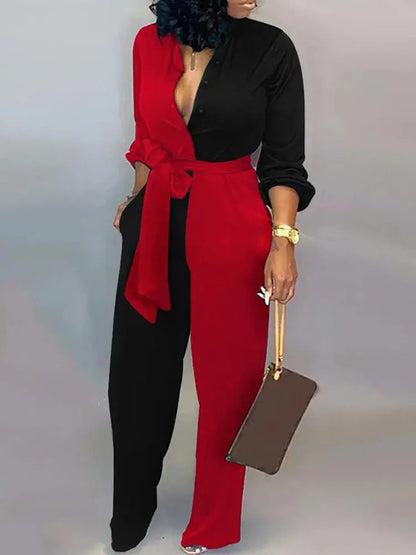 Elegante wijde damesjumpsuit met diepe V-hals en strikceintuur – SENA FLOW - Glamorix