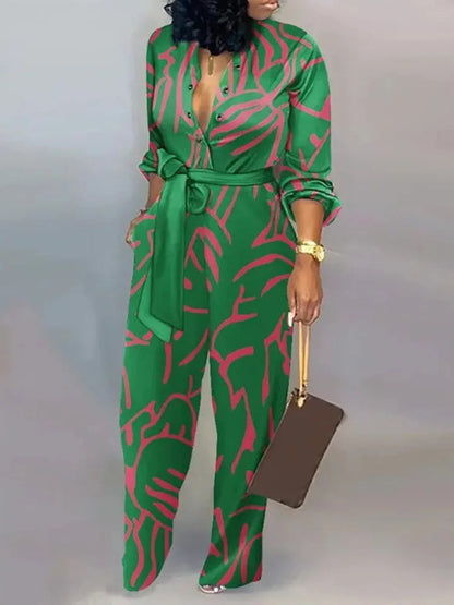 Elegante wijde damesjumpsuit met diepe V-hals en strikceintuur – SENA FLOW - Glamorix