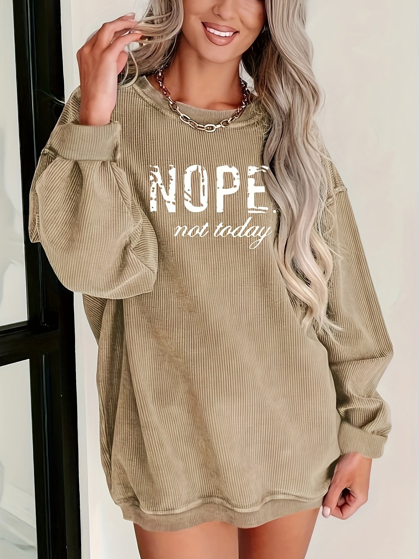 Een lange mouw top met ronde hals voor dames – NOVAQ - Glamorix