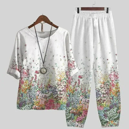 Tweedelige dames set met bloemenprint top en rechte broek – AUREA SET - Glamorix