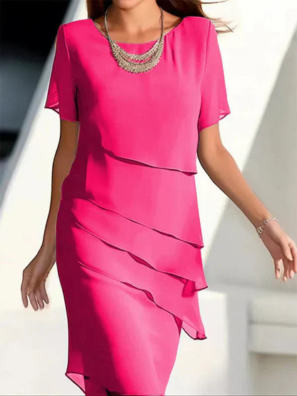 Gelaagde dames midi-jurk met korte mouwen en speelse flair – LOREA LAYR - Glamorix