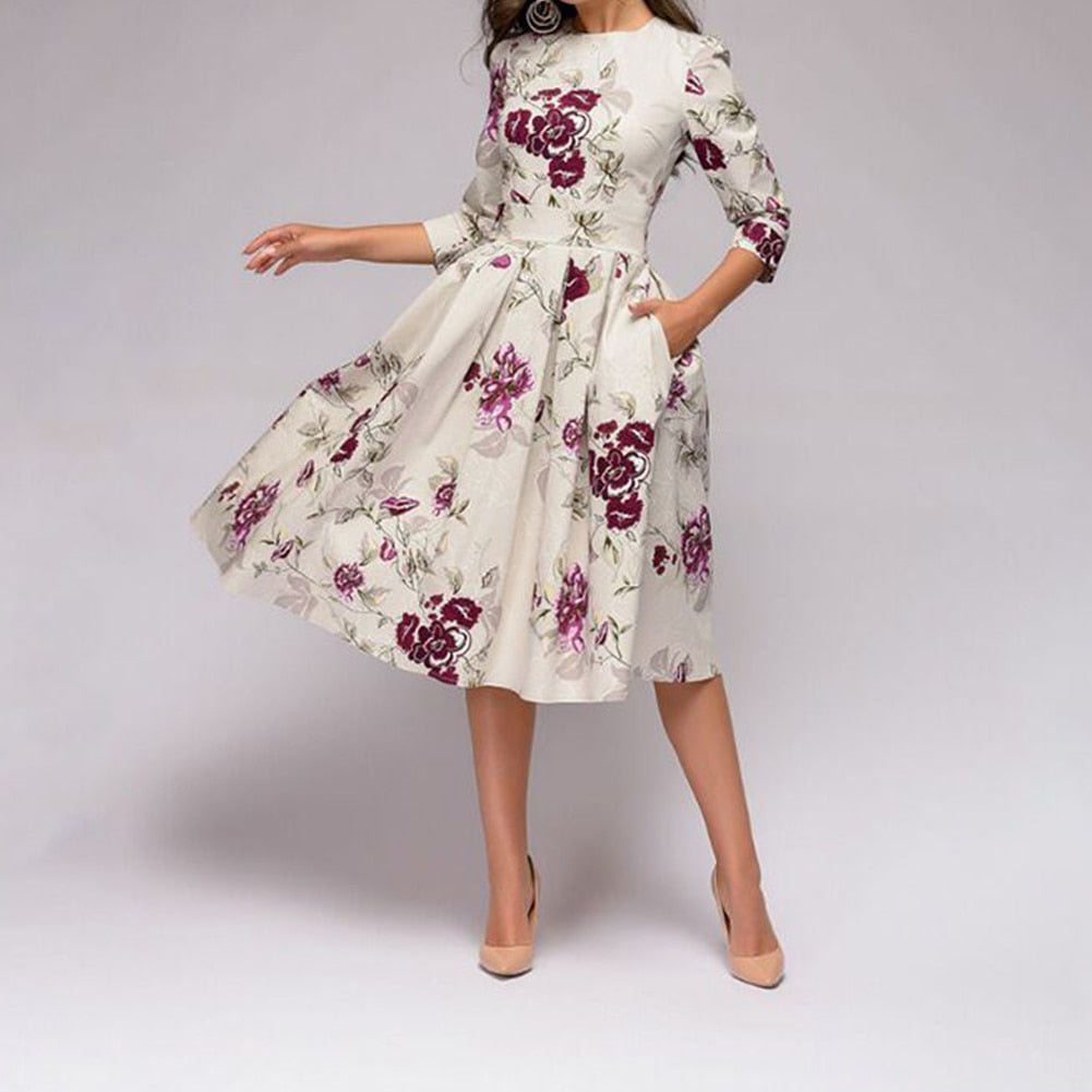 FLORENCE - Midi-jurk met bloemenprint en praktische zakken