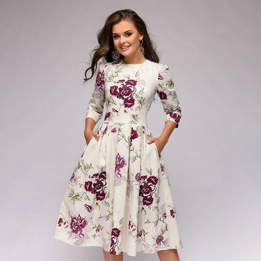 FLORENCE - Midi-jurk met bloemenprint en praktische zakken